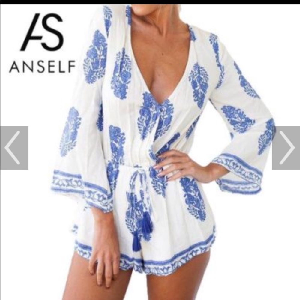 Anself blue and blue romper. New with tags!